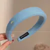 Diadema retorcida fresca y elegante, de lujo ligero para mujer, adecuada para el uso diario en primavera y verano, diadema de ala ancha, dulce accesorio para el cabello estilo coreano