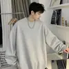 Suéter casual versátil de manga larga para hombre, venta al por mayor de fábrica, moderno, juvenil, cuello redondo, moda para exteriores, top liso