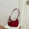 Bolso versátil de moda estilo coreano transfronterizo para el trabajo, modelo nuevo de nicho otoño 2026, bolso de mano para mujer, bolso tipo dumpling para hombro y cruzado