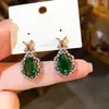 Brincos de Flor de Abóbora Gota d'Água Zircônia Esmeralda Retro Agulha de Prata Luxo Leve Nicho Temperamento Brincos de Alta Qualidade para Mulheres