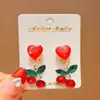 Pinzas para Orejas de Pony de Año Nuevo para Niños Sin Perforación Dibujos Animados Lindas Rojas Joyería para Niñas Sin Perforación Accesorios para Orejas No Dañinos