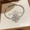 Pulsera Flor de Circonita Deslumbrante Estilo Corte Austriaco, Pulsera de Lujo Ligero y de Alta Gama, Joyería de Mano Versátil Moda Europea y Americana para Mujeres
