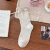 Calcetines con lazo de cinta de encaje para mujer, calcetines dulces de encaje hasta la mitad de la pantorrilla, calcetines de malla con lunares y volantes de gato de dibujos animados japoneses, calcetines jk