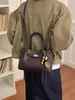 Bolso de cubo casual de moda transfronterizo 2025 otoño e invierno nuevo bolso de hombro con textura retro bolso de mano de personalidad bolso tote