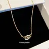 Collar colgante de cerdo con nariz de botón y circonita estilo Xiaohongshu, una cadena para la clavícula única y elegante con un diseño minimalista y personalizado para mujeres