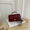 Bolso de cadena de alta gama, exquisito para mujer, nuevo bolso de mano de moda retro 2026, bolso cruzado versátil con patrón de diamantes