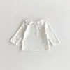 Ropa Nueva de Otoño 2025 para Niñas Camiseta Básica de Manga Larga para Bebé Cuello de Muñeca Bordado Camiseta Exterior Versátil