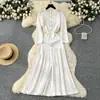 Vestido de Punto Francés Semitransparente con Aberturas Nuevo Otoño 2025 para Mujer, Cuello Redondo, Cintura Alta, Ajustado, Manga Larga, Bolsillos Dobles con Solapa