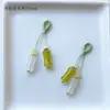 Precio mayorista directo de fábrica pulsera hecha a mano pulsera con colgante diy accesorios pequeños deslizantes colgante de garra de gato lindo Joker