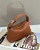 Bolsa Retrô de Couro Genuíno Personalizada de Fábrica, Elegante e Estilosa, Bolsa de Mão com Design de Nicho, Bolsa de Mão de Couro Bovino de Primeira Camada