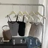 Camisola de chica picante con diseño de botones a rayas y copas acolchadas integradas, casual, a la moda, cómoda y se puede usar como capa exterior