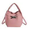 Bolsos Pequeños Transfronterizos para Mujer 2025 Nuevo Color Sólido Bolso Tipo Kelly Bolso Popular Bolso Cubo Bolso de Hombro Cruzado de Nicho
