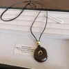 Otoño e Invierno Resina Geométrica Hueca Piedra Ojo de Tigre Colgante Collar Accesorios Cadena para Suéter de Mujer Lujo Ligero Collar de Gama Alta