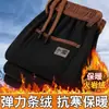 Nuevos pantalones casuales rectos gruesos de pana para otoño e invierno de comercio exterior, con forro polar, holgados y de corte slim, resistentes al frío para hombre