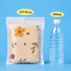 Bolsa de hueso de película perlada cable de datos funda para teléfono móvil bolsa de embalaje bolsa para joyas bolsa perlada autosellable compuesta