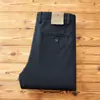 Nueva colección otoño e invierno 2026: forrados de polar, gruesos, texturizados, de sarga, elásticos, pantalones largos, de alta gama, corte holgado, pierna recta, pantalones casuales versátiles para hombre