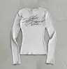 Outono e Inverno 2026 Europeu e Americano Transfronteiriço Estampado Camiseta Y2K Moda Elegante Feminina Atacado Moderna Versátil Cruz