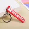 Chaveiro de borracha macia com letra de logo, pingente de placa em formato de tira longa, acessório de marca corporativa, anúncio de exposição empresarial