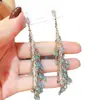 Brincos de Franja Gota de Água em Vidro Agulha de Prata Brincos Boêmios de Luxo Leve Brincos de Temperamento Niche High-End Atacado para Mulheres