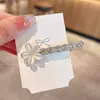 Exquisito y de alta gama clip para el pelo con pedrería estilo coreano para mujer, nuevo modelo 2026, pinza de pico de pato para la frente, pasador recto para flequillo lateral