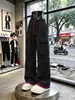 Pantalones de trabajo casuales con diseño multibolsillos en contraste negro y rojo para hombre, pantalones de pierna ancha rectos y holgados de tendencia street style con cordón