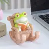 Creativo Lindo Relleno de Escritorio de Oficina Rana Soporte para Teléfono Móvil Artesanía de Resina Adornos Decorativos Regalo de Cumpleaños