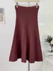 Falda de punto simple casual de color liso estilo coreano, nueva de otoño 2026, de cintura alta, corte ajustado, línea A, recta