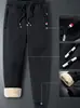 Pantalones casuales ajustados de lana de cordero gruesa con forro polar, de tendencia, para invierno, cálidos, de pierna recta, para hombre