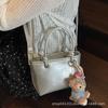 Bolsa Balde Portátil para Mulheres 2025 Nova Moda Estilo Coreano Bolsa Pequena Design de Nicho Casual Roupa de Trabalho Bolsa de Ombro Transversal