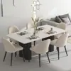 Mesa de comedor rectangular minimalista y juego de sillas, adecuado para apartamentos pequeños, moderno, simple y lujoso, una opción popular para el comedor del hogar