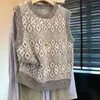 Elegante colete de tricô com blocos de cor e padrão de losangos para outono e inverno, adequado como camada base, suéter de puxar sem mangas