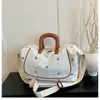 Bolso de mano nuevo estilo coreano con lazo para viajes, bolsa casual para viajes cortos con separación de húmedo y seco, bolsa de yoga y fitness