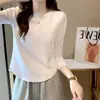 Camiseta de algodón acanalado de manga larga para mujer, nuevo estilo primavera/otoño, corte ajustado, diseño único, dobladillo curvo irregular, top de moda