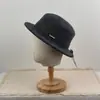 Nuevo sombrero de pescador de punto estilo francés inspirado en Hepburn para mujer, versátil, moderno, elegante y que estiliza el rostro, adecuado para otoño e invierno