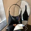 Bolso de axila de moda para mujer, simple y versátil, elegante bolso tote retro, bolso de hombro y cruzado de alta gama y moderno