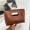 Bolso de mano estilo coreano para mujer, nueva colección 2026, clutch tejido de PU de color sólido, alta calidad, adecuado para fiestas y para llevar un teléfono, diseño versátil