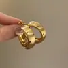 2026 Nuevos Pendientes de Lunares Plateados Cepillados Estilo Coreano y Japonés, Moda de Alta Gama, Versátiles, Elegantes, Simples, de Nicho, Únicos para Mujeres