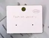 KOMEE 4.5*4cm Papel Perla Blanco cuatro agujeros hueco PVC aretes aretes aretes tarjeta tarjeta para joyería cartón se puede colgar