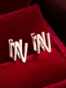 Pendientes de botón casuales de moda populares, creativos, con diseño de letra, simples, versátiles para el día a día, de alta calidad, lujo ligero