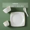 Vajilla de Hotel Jingdezhen Cerámica de Hueso con Borde Dorado, Tazones y Platos Cerámicos con Logo Impreso del Grupo Nacional de Construcción de China para Uso en Comedores de Unidad