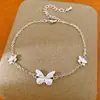 Pulsera de mariposa con incrustaciones de circonita y baño de oro real de 14k, brazalete de nicho de lujo ligero, joyería de moda dulce y elegante