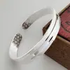 Pulsera de estilo étnico plateado con relieve de la Gran Muralla, pulsera distintiva de tendencia de moda, pulsera creativa que combina con todo, anillo cóncavo.