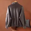 Ropa de mujer de estilo europeo y americano transfronteriza, nueva colección de otoño 2026: cuello solapa, abrigo de piel de oveja con cinturón, top talla grande