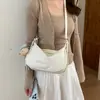 Bolsa de Ombro Transversal Versátil Casual Cor Sólida Estilo Bolinho para Mulheres, Nova Moda de Verão 2026 Nicho para o Dia a Dia