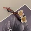 Pinza Floral Estilo Vintage para Mujer 2025 Modelo Nuevo Pinza para Moño en la Parte Trasera de la Cabeza Pinza Retorcida Accesorio para el Cabello Pinza para el Cabello