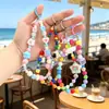 Cadena para teléfono de cuentas color dopamina con lazo en forma de corazón, llavero, colgante para bolso, correa para cámara CCD