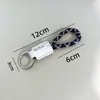 Llavero de cuerda tejida a mano de cuero para coche personalidad creativo colgante de llave patrón de texto imprimible venta al por mayor de fábrica