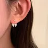 Pendientes de lazo de circonita de aguja de plata Corea del Sur ins moda dulce pendientes versátiles lujo ligero alta gama venta al por mayor