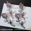 Accesorios de Estilo Oscuro Estilo Europeo y Americano Mariposa Negra Pistola Cruz de Rosa Colgante Pulsera de Cuentas DIY Collar