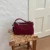 Elegante y chic bolso de mano tipo dumpling para mujer, nuevo modelo otoño e invierno 2026, patchwork de estampado de leopardo de lujo ligero para uso diario, bolso de hombro y cruzado